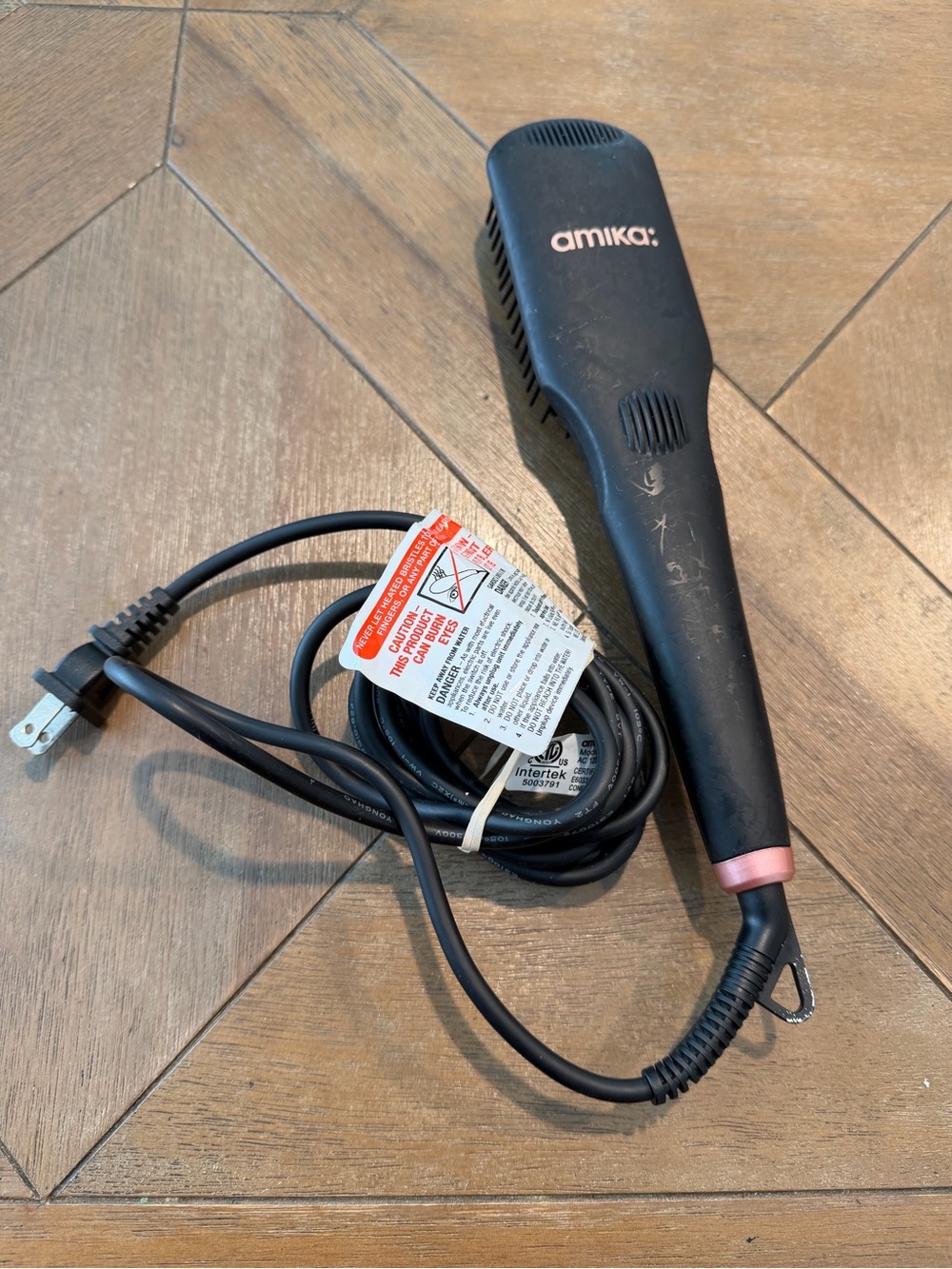 Amika Heated Straightening Brush in Black with Rose Accent